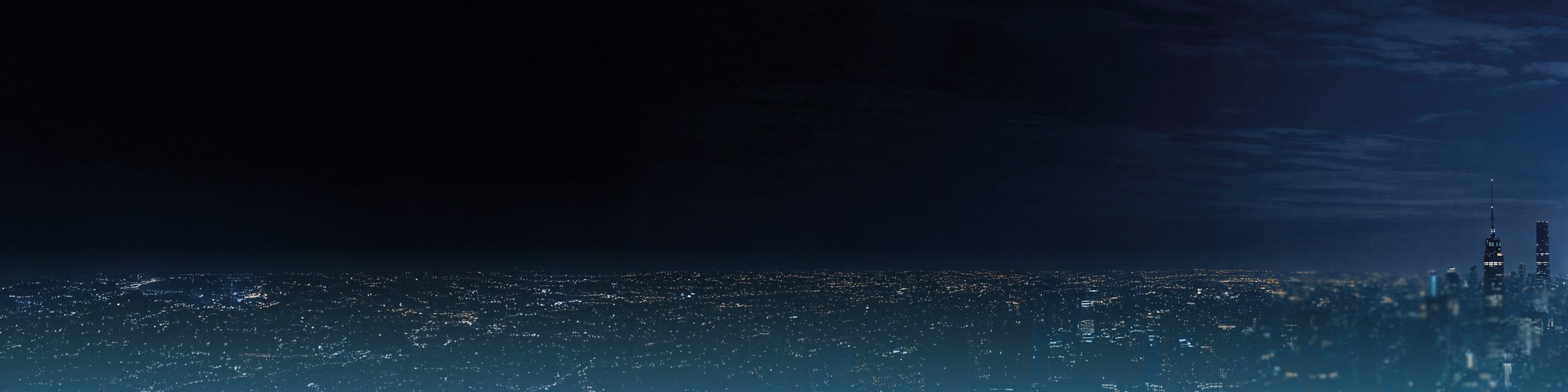 Nächtliche Stadt mit Skyline